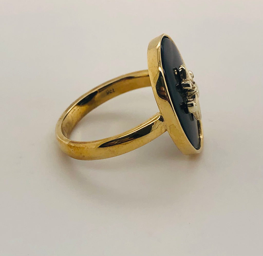 Solid gold store onyx ring